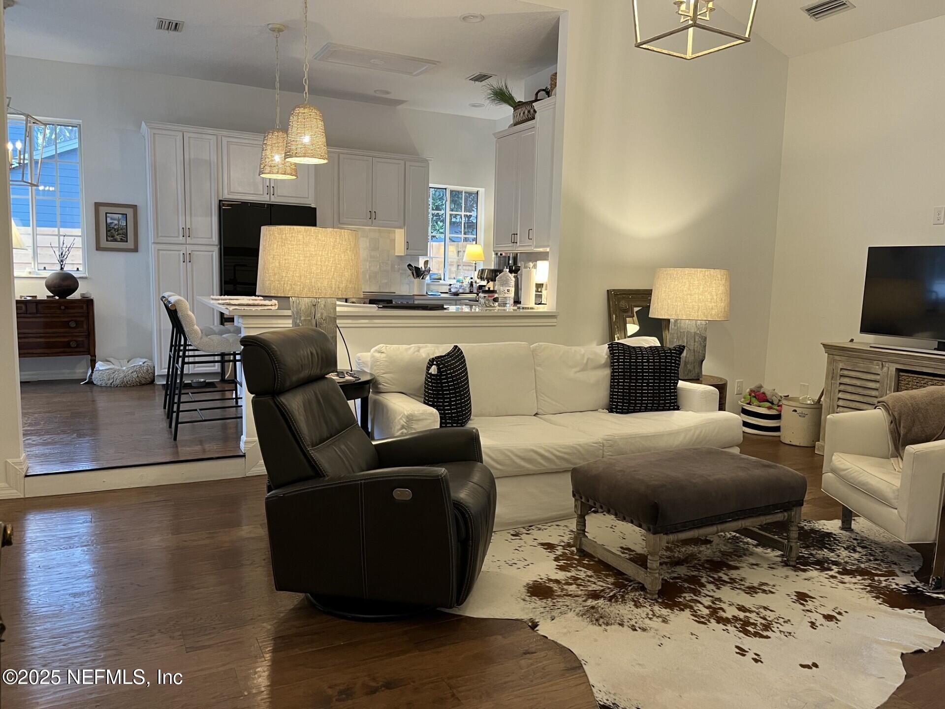 340 Shamrock Road St. Augustine, FL 32086 - Photo 6 of 21 a living room with furniture and a flat screen tv