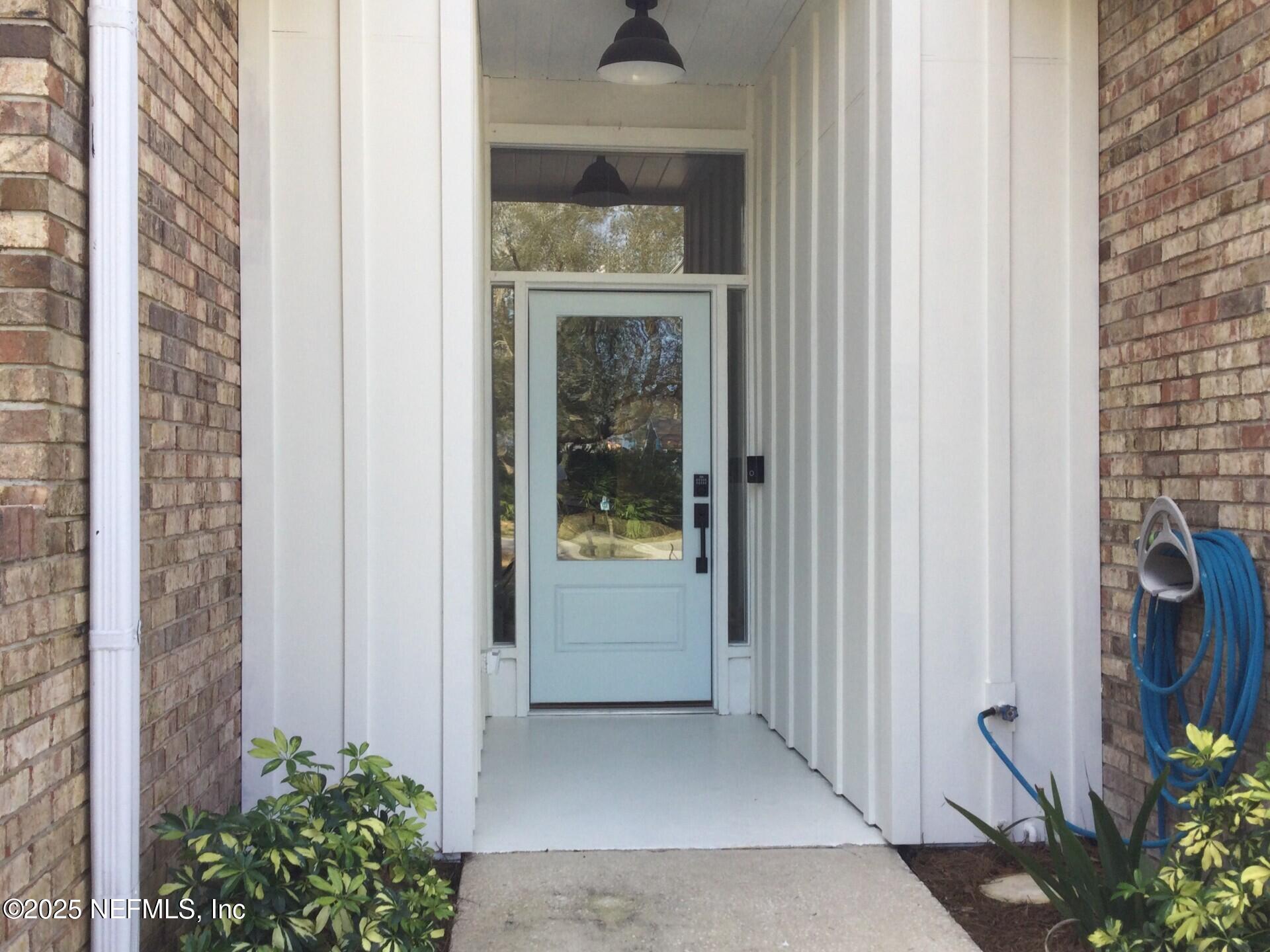 340 Shamrock Road St. Augustine, FL 32086 - Photo 7 of 21 a view of a entryway of the house
