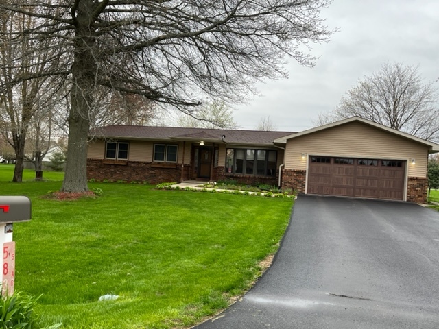 5833 South Skare Road Rochelle, IL 61068 - Photo 1 of 41 a view of house with a yard