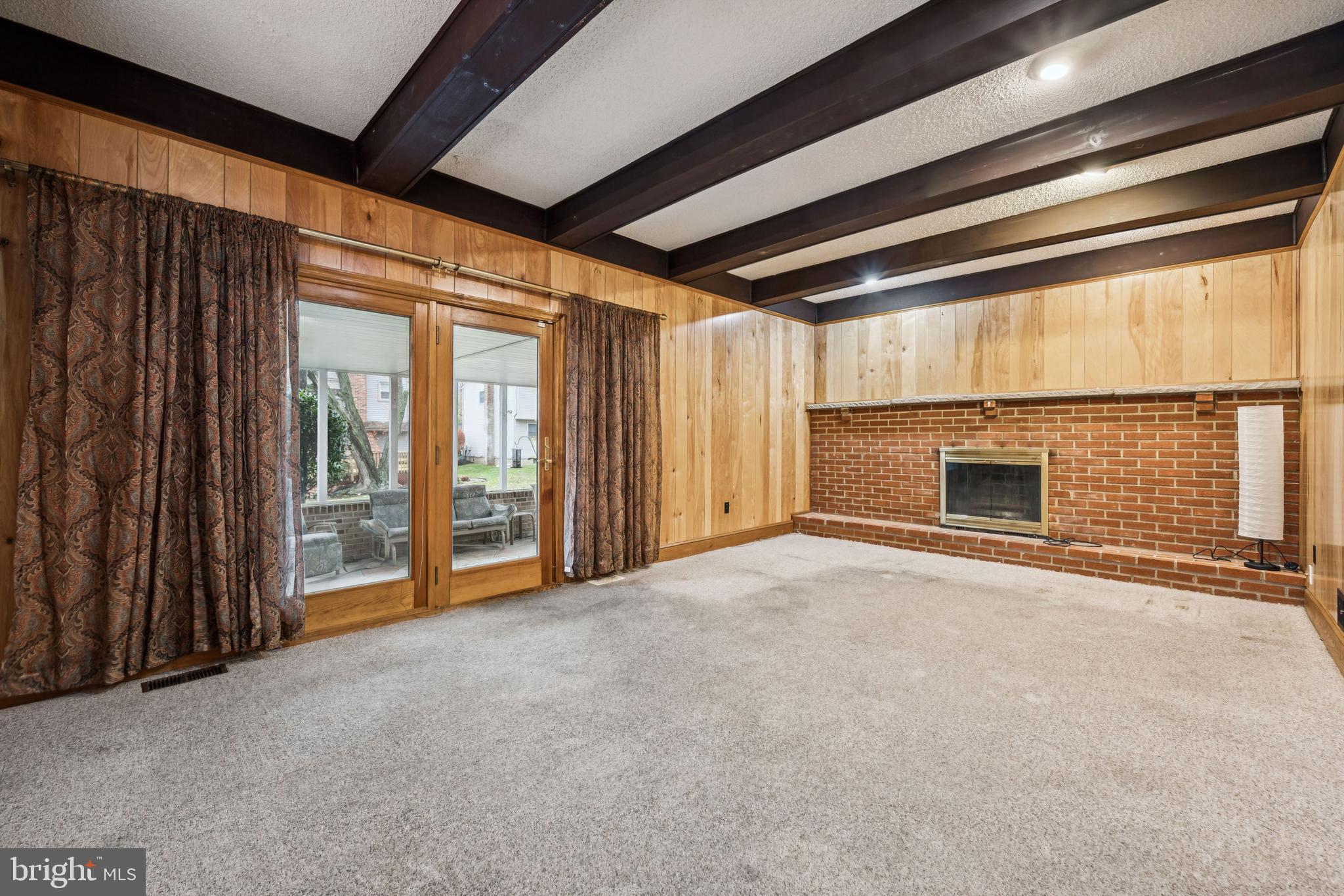 503 Balsam Road Cherry Hill, NJ 08003 - Photo 13 of 25 a view of an empty room with a fireplace and a window