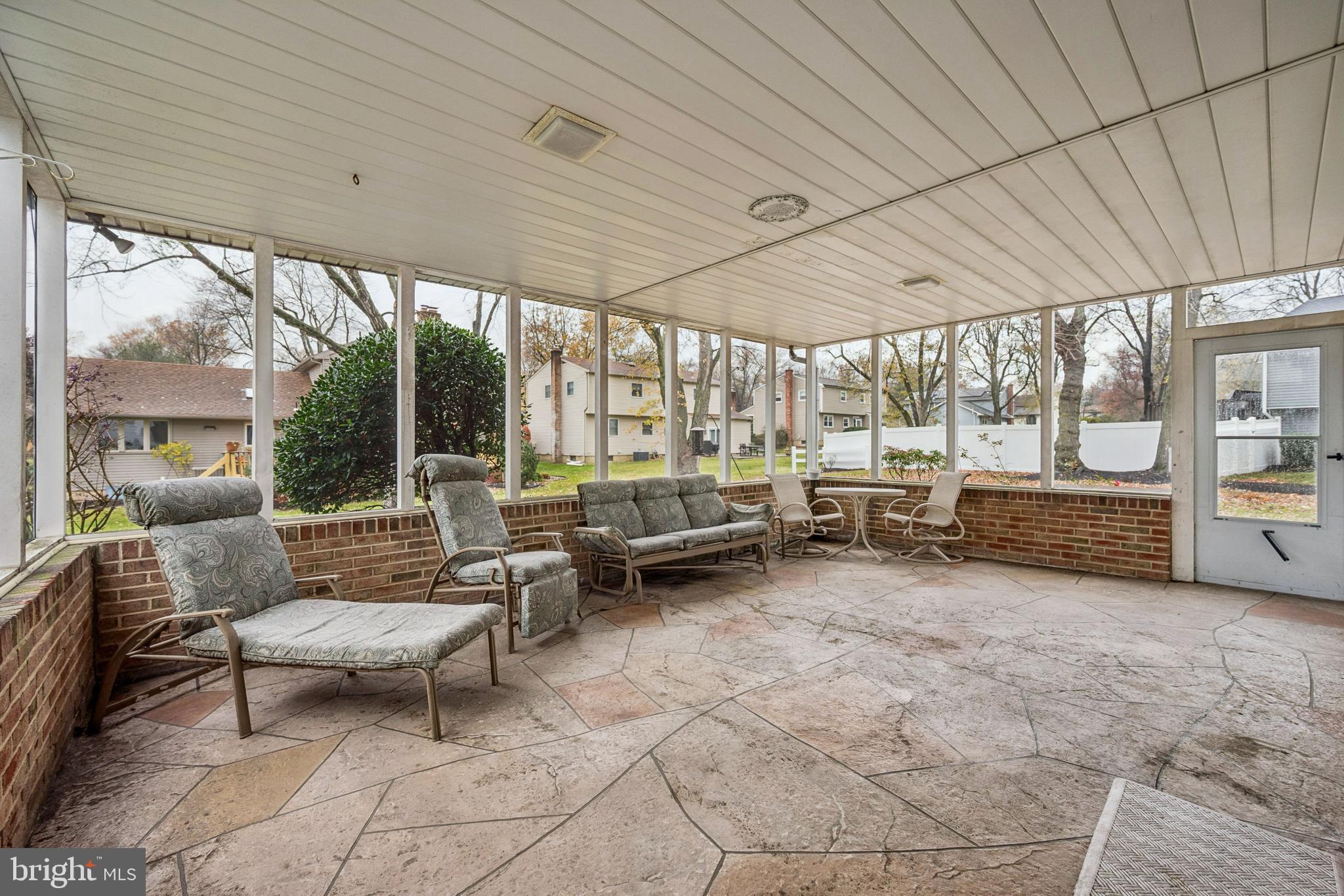 503 Balsam Road Cherry Hill, NJ 08003 - Photo 15 of 25 a view of a patio with table and chairs next to a yard