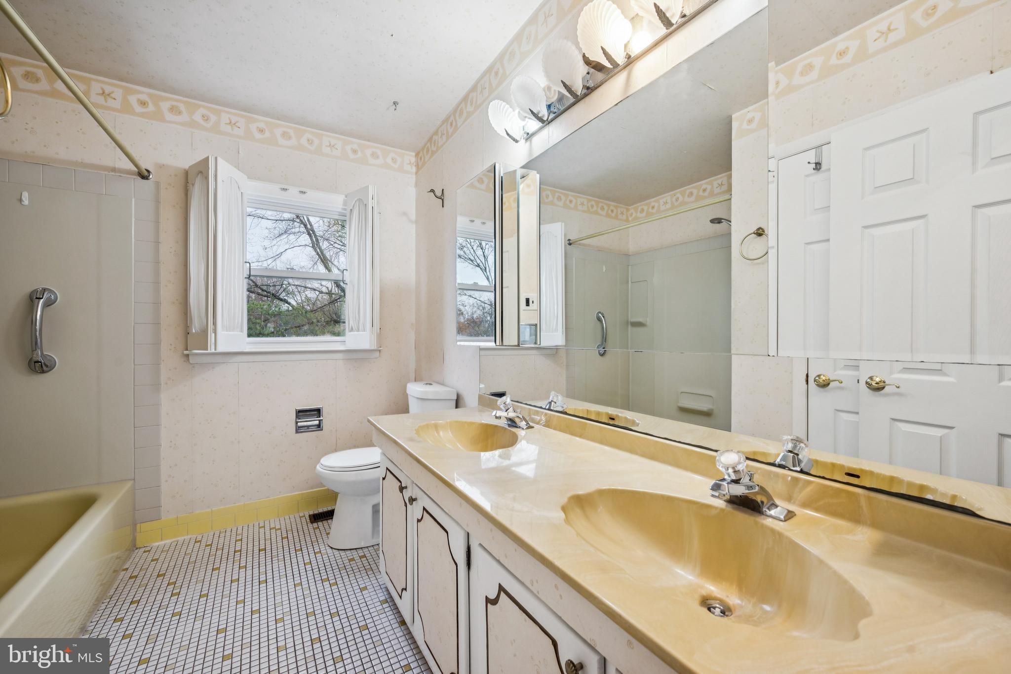 503 Balsam Road Cherry Hill, NJ 08003 - Photo 23 of 25 a bathroom with a tub sink and mirror
