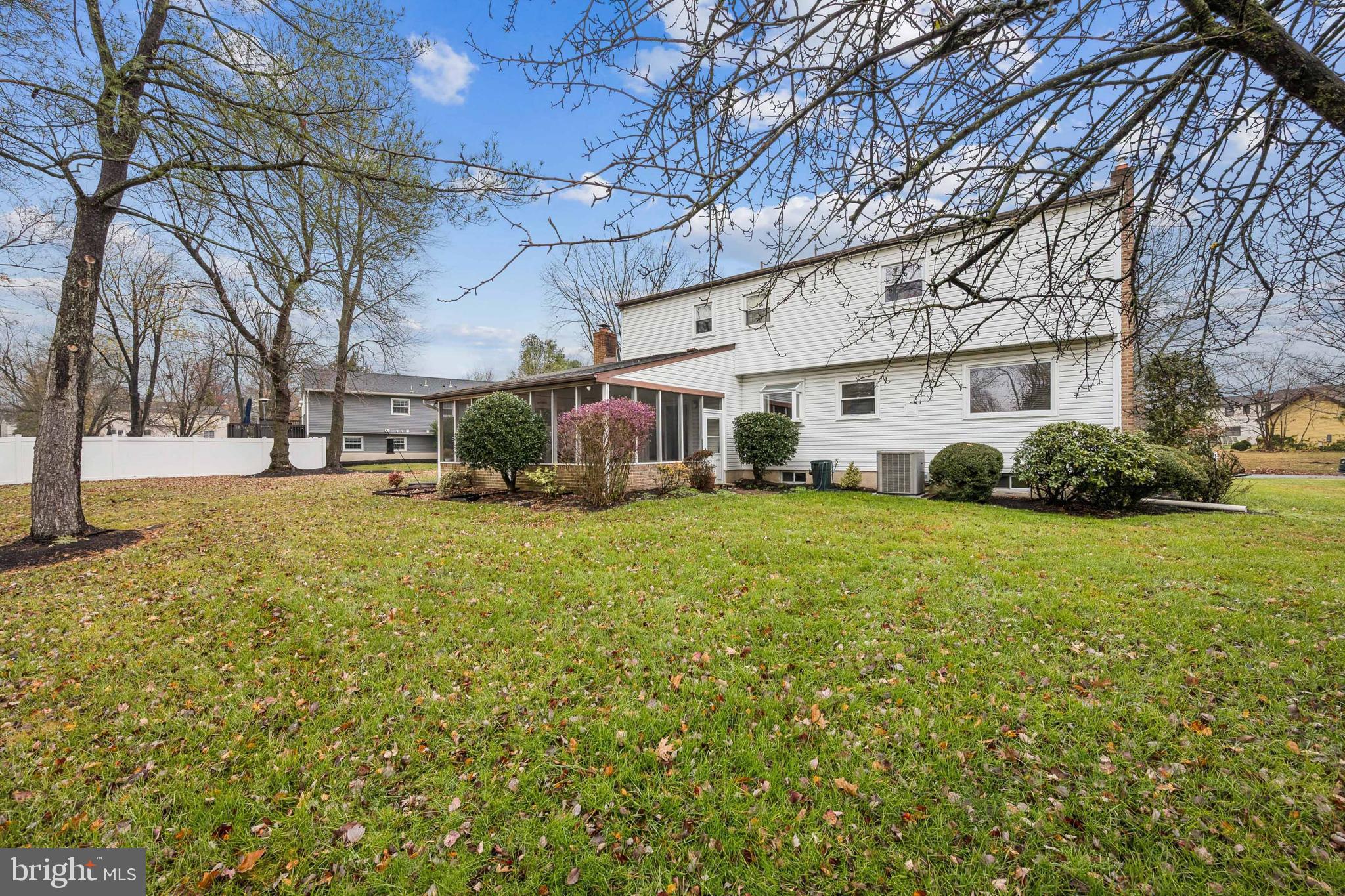 503 Balsam Road Cherry Hill, NJ 08003 - Photo 24 of 25 a yellow house sitting in middle of the middle of a yard