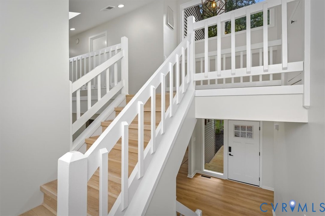 4200 Northwich Road Midlothian, VA 23112 - Photo 28 of 50 Stairway with wood finished floors, a high ceiling