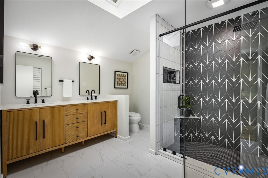 4200 Northwich Road Midlothian, VA 23112 - Photo 33 of 50 Bathroom featuring double vanity, a stall shower,