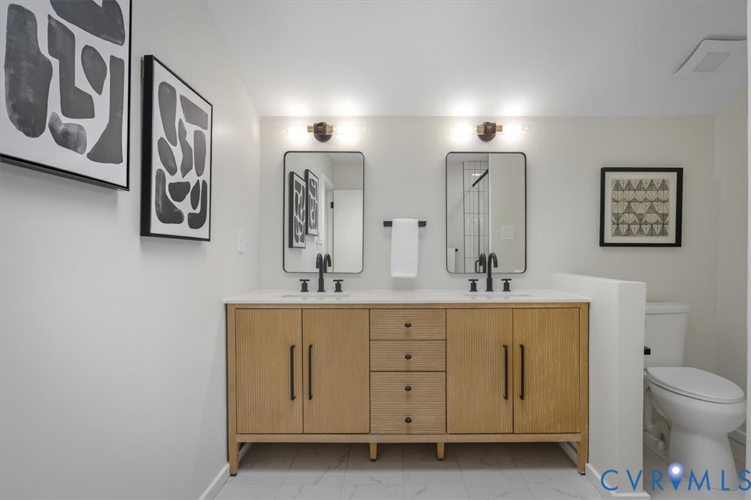 4200 Northwich Road Midlothian, VA 23112 - Photo 35 of 50 Bathroom with double vanity and light marble finis