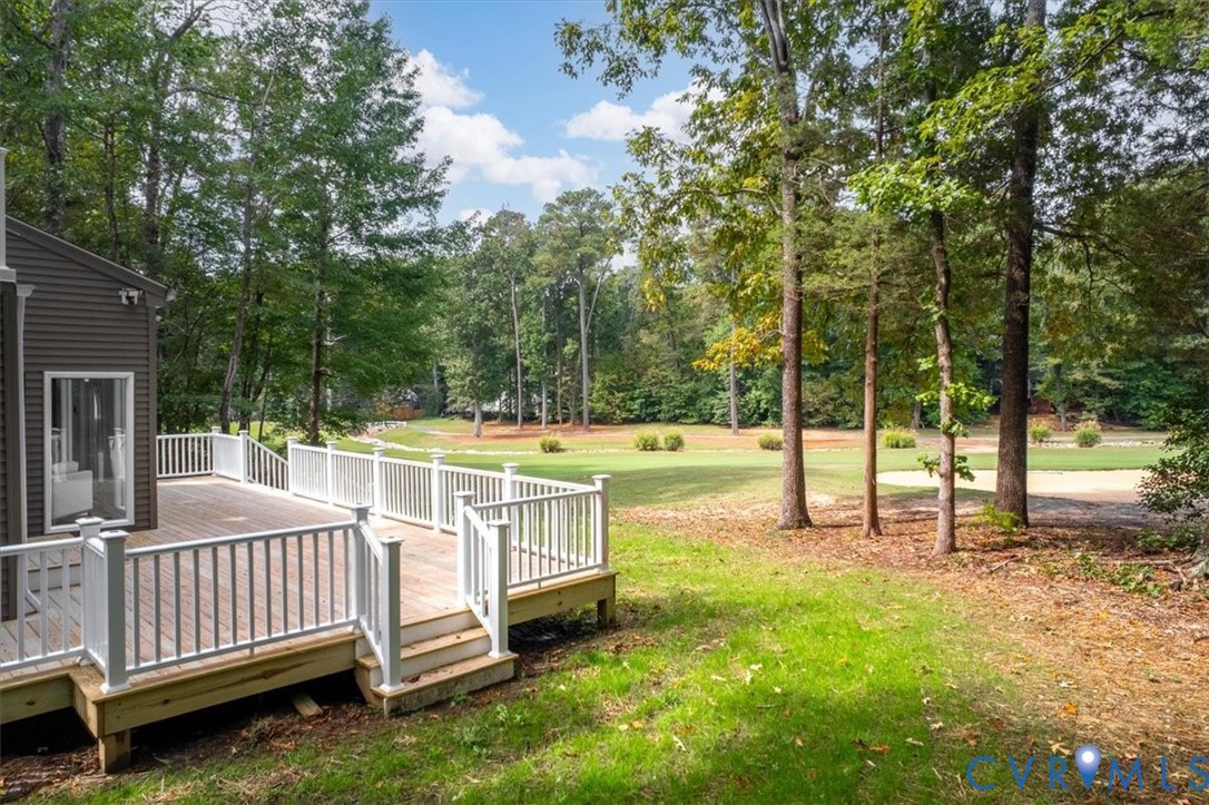 4200 Northwich Road Midlothian, VA 23112 - Photo 43 of 50 View of grassy yard with a deck and view of scatte