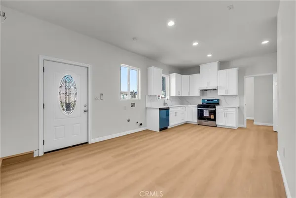 a view of kitchen with wooden floor