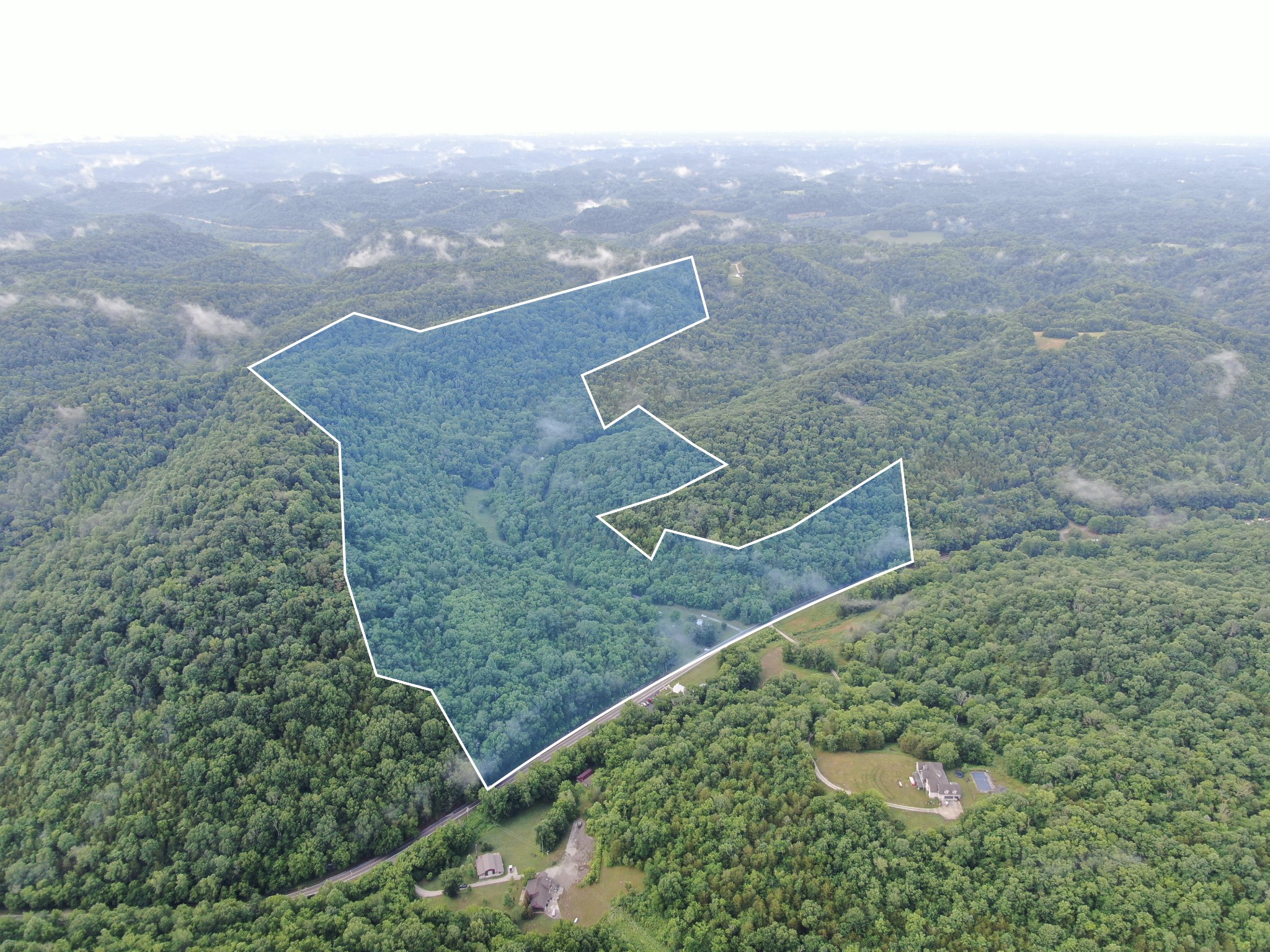 an aerial view of residential house with outdoor space