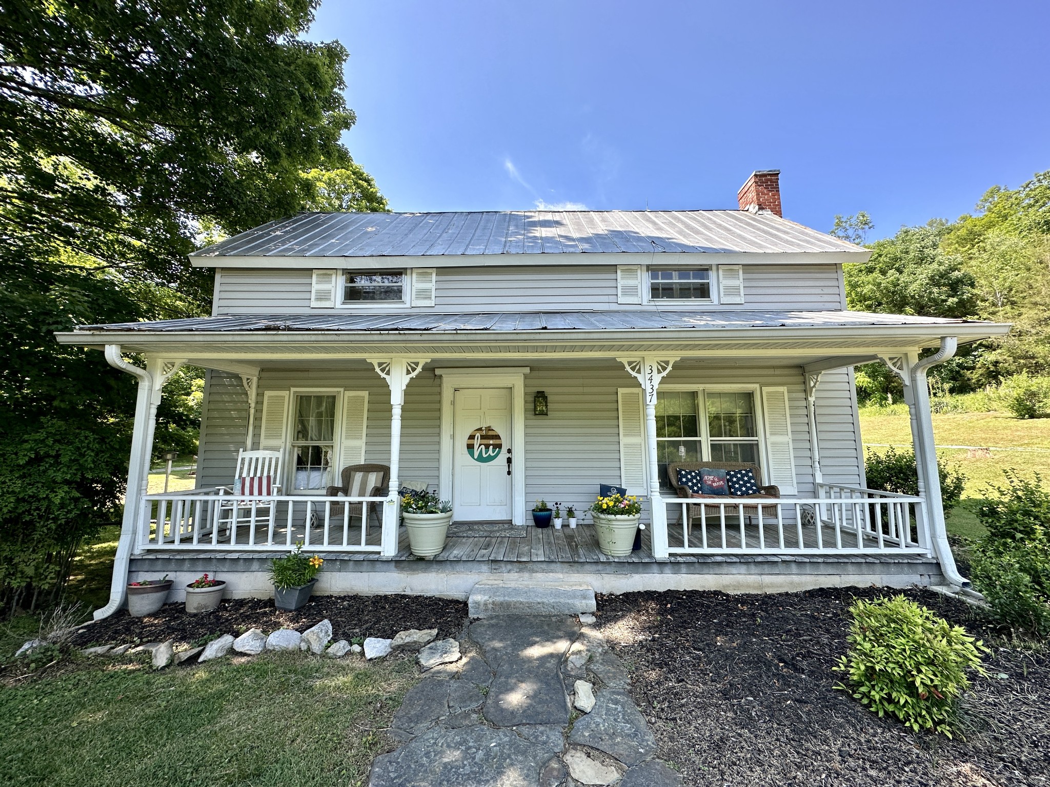 3437 Wolf Creek Road Silver Point, TN 38582 - Photo 11 of 70 a view of a house with a garden