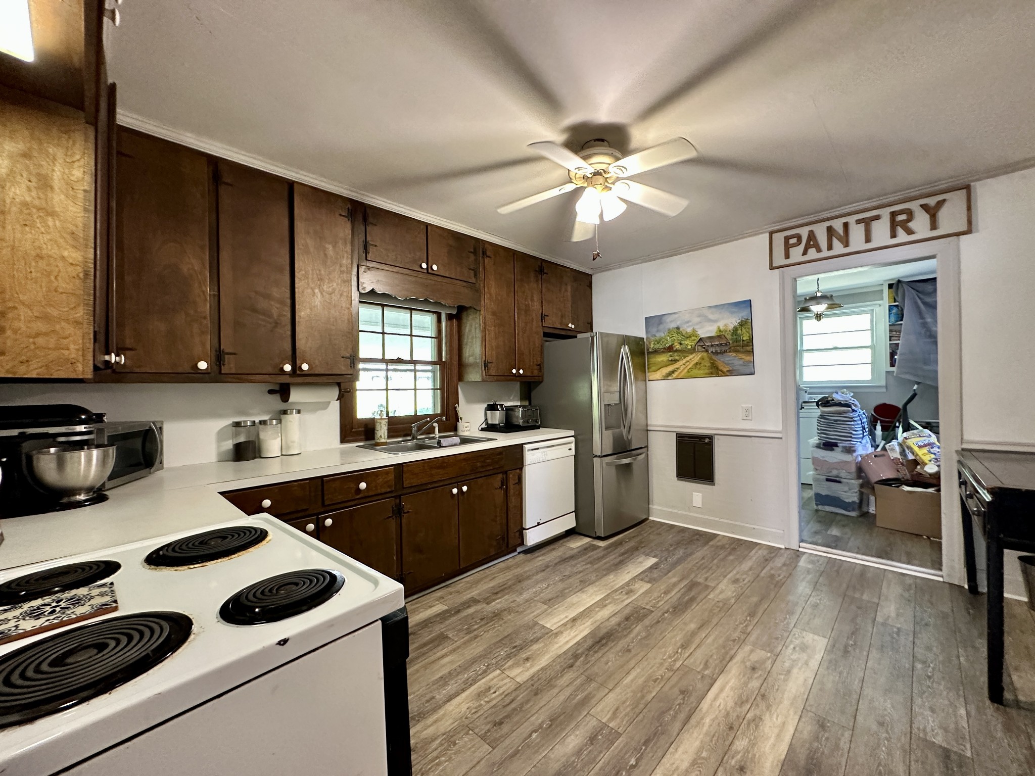 3437 Wolf Creek Road Silver Point, TN 38582 - Photo 17 of 70 a kitchen with a stove a refrigerator and a sink