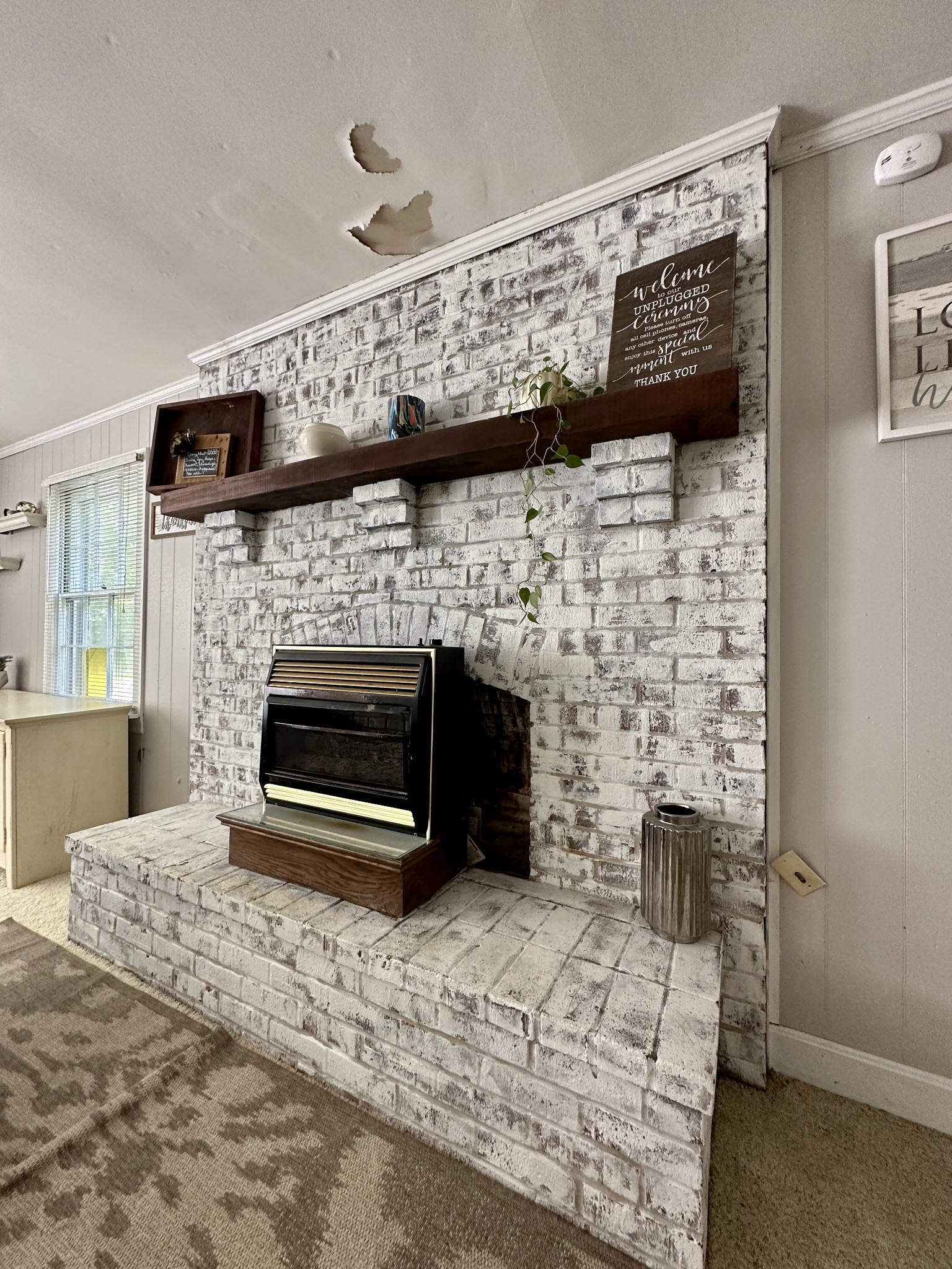 3437 Wolf Creek Road Silver Point, TN 38582 - Photo 20 of 70 a living room with a fireplace