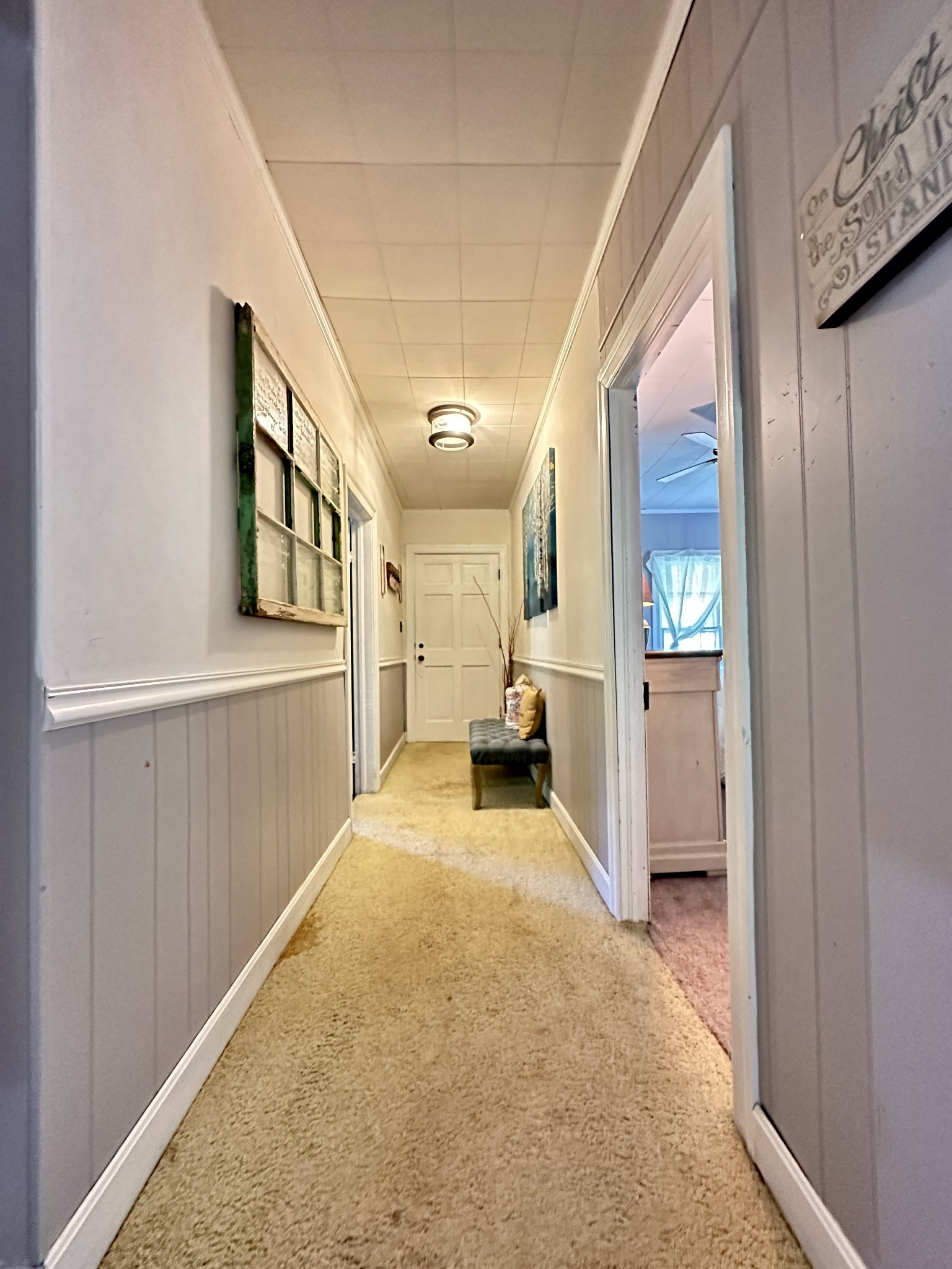 3437 Wolf Creek Road Silver Point, TN 38582 - Photo 21 of 70 a view of a hallway with a livingroom and a bathroom with sink