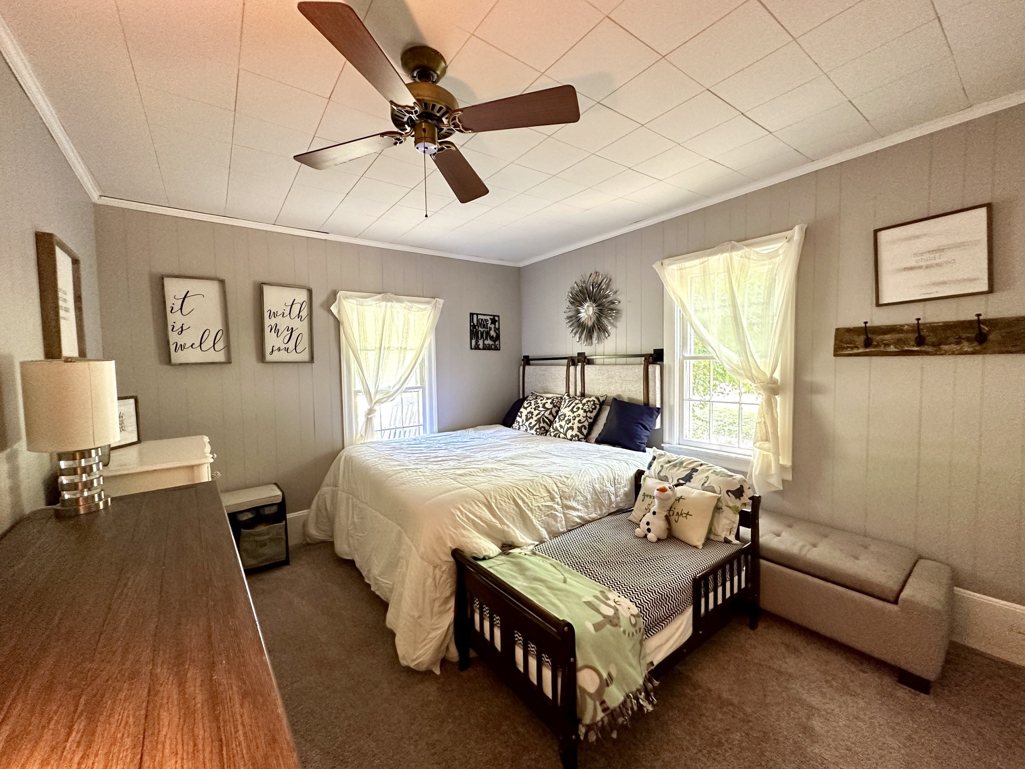 3437 Wolf Creek Road Silver Point, TN 38582 - Photo 26 of 70 a bedroom with a bed a couch and window