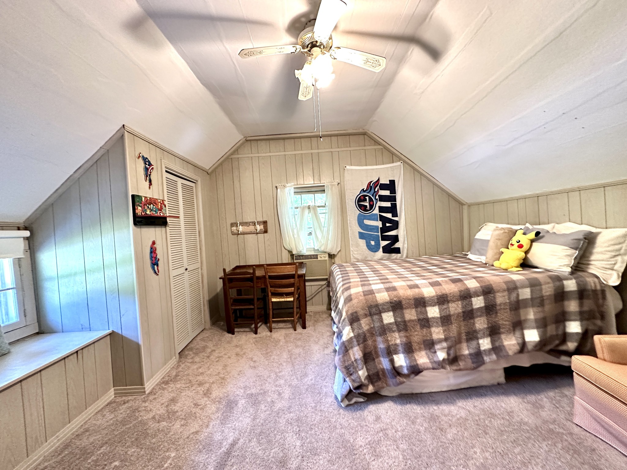 3437 Wolf Creek Road Silver Point, TN 38582 - Photo 29 of 70 a bedroom with a bed and a chandelier