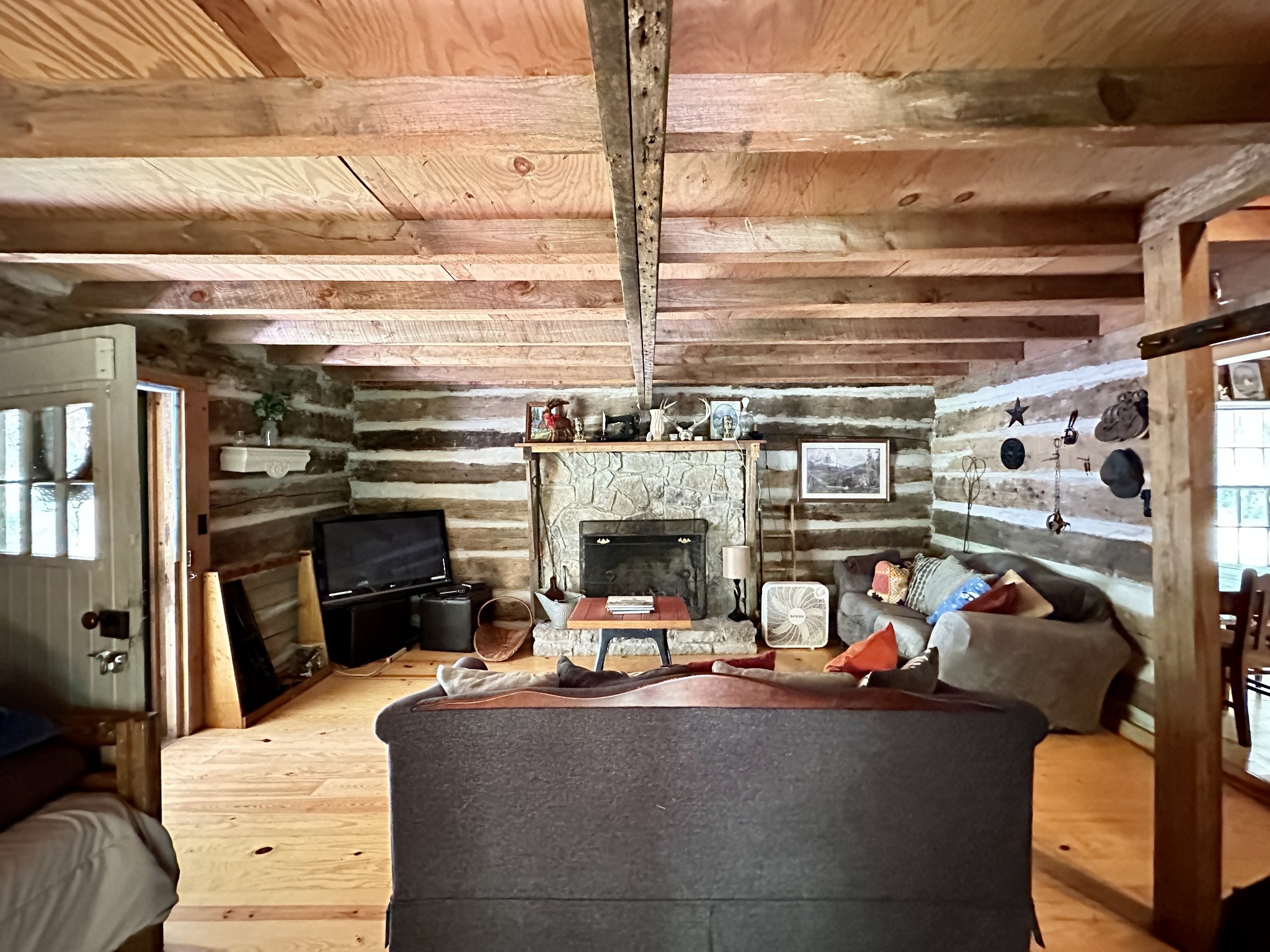 3437 Wolf Creek Road Silver Point, TN 38582 - Photo 56 of 70 a view of a living room with furniture and a fireplace