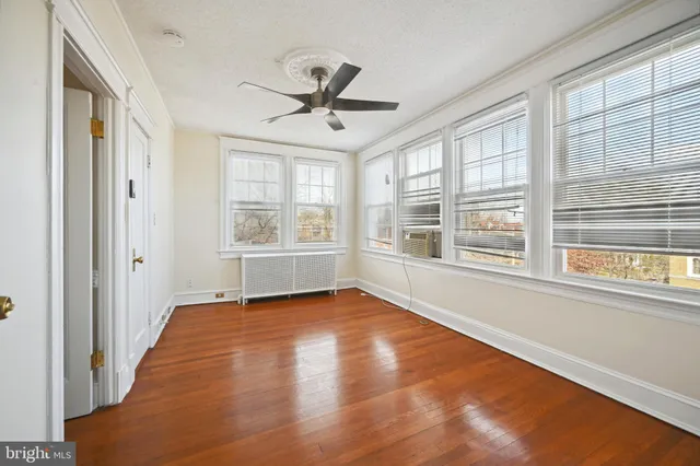 a view of a room with racks on the wall