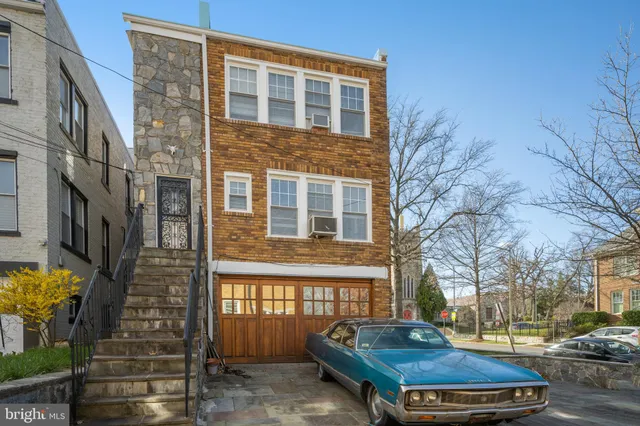 a picture of a bathroom with a sink and a mirror