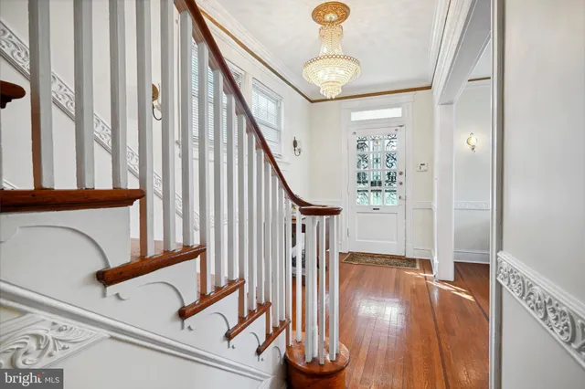 a view of livingroom with hardwood floor and a fireplace