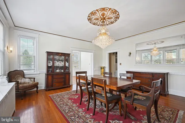 a kitchen with granite countertop a sink stainless steel appliances and cabinets