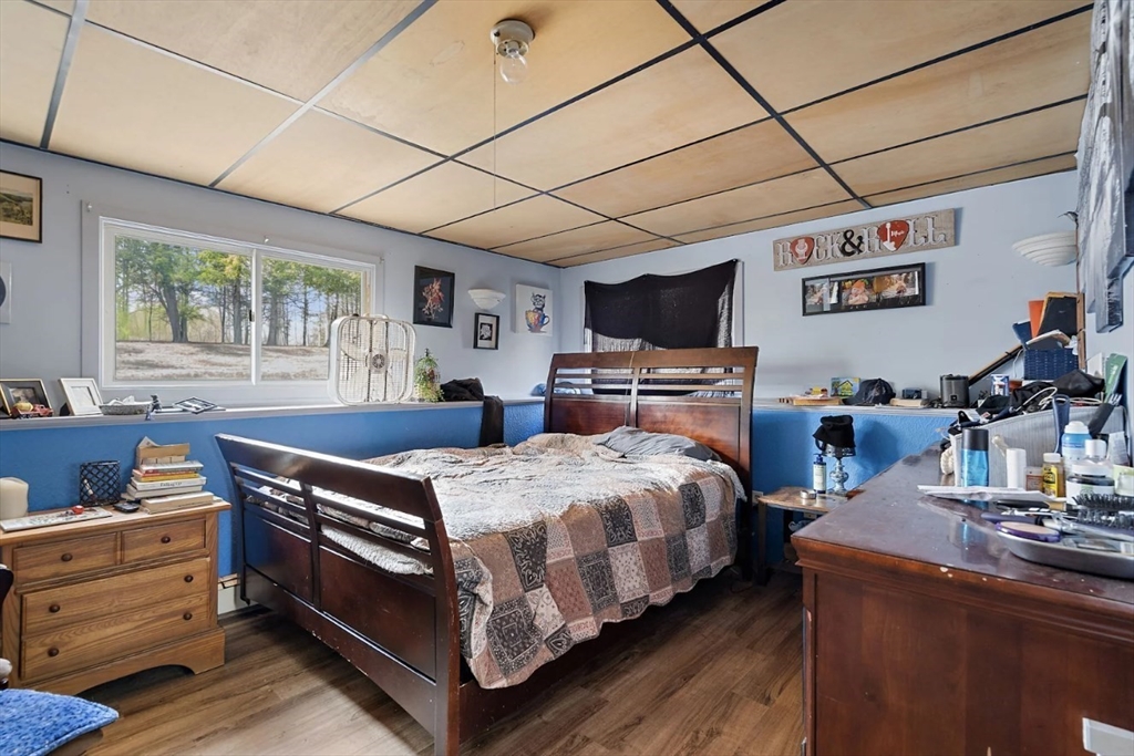 6 Plum Tree Lane Hubbardston, MA 01452 - Photo 10 of 31 a bed room with a bed and a desk