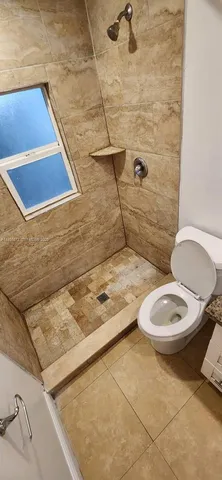a bathroom with a toilet