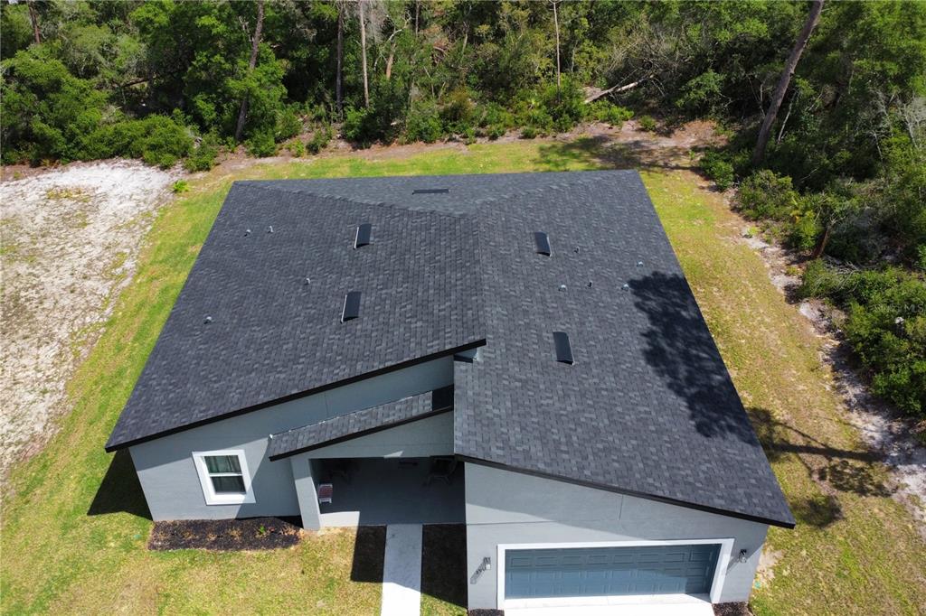 2914 Southwest 162nd Street Road Ocala, FL 34473 - Photo 47 of 47 a aerial view of a house with a yard