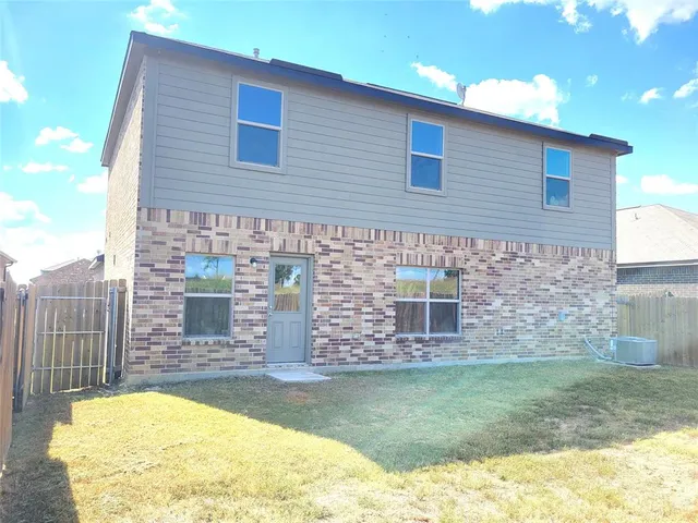 a view of swimming pool with seating space