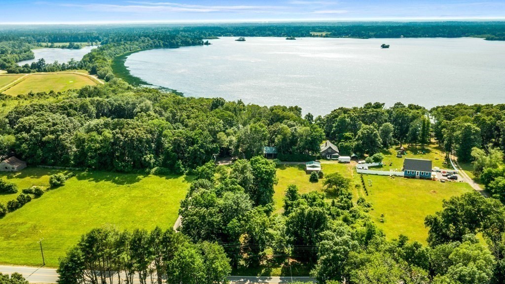 343 Neck Road Rochester, MA 02770 - Photo 7 of 31 a view of a lake with outdoor space