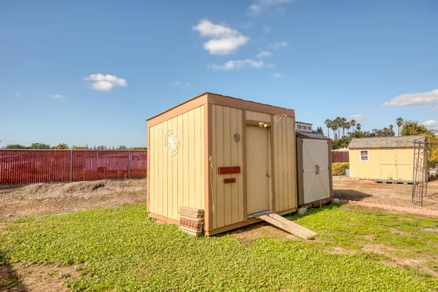 a view of a backyard of a house