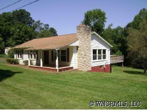 335 Osborne Ridge Road Canton, NC 28716 - Photo 2 of 9 a front view of a house with a yard