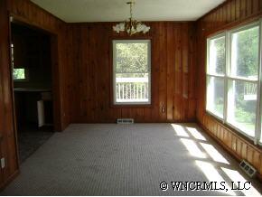 335 Osborne Ridge Road Canton, NC 28716 - Photo 4 of 9 a view of an empty room with a window