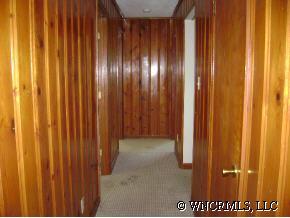 335 Osborne Ridge Road Canton, NC 28716 - Photo 6 of 9 a view of a elevator with wooden walls