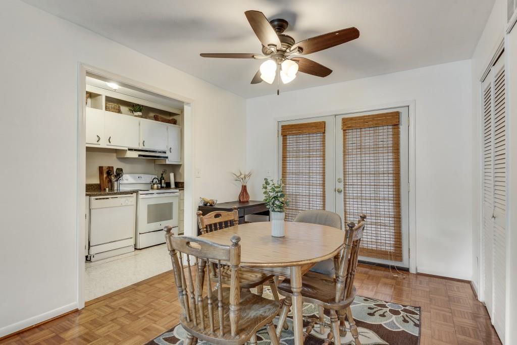 510 Coventry Road, Unit 19B Decatur, GA 30030 - Photo 17 of 31 a kitchen with a table chairs and a refrigerator