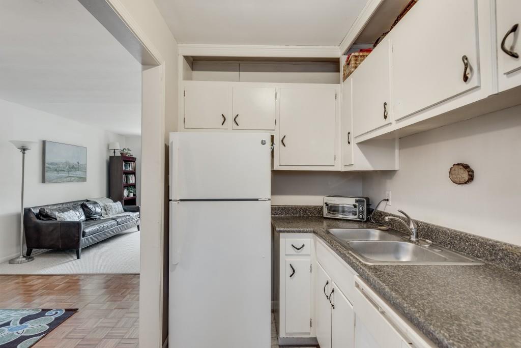 510 Coventry Road, Unit 19B Decatur, GA 30030 - Photo 20 of 31 a kitchen with a sink a stove and refrigerator