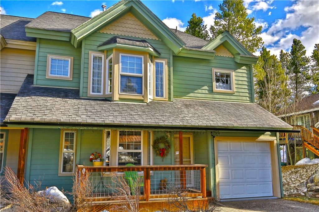 33 B Red Feather Road Breckenridge, CO 80424 - Photo 1 of 15 a front view of a house with glass windows