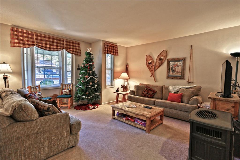 33 B Red Feather Road Breckenridge, CO 80424 - Photo 2 of 15 a living room with furniture and a large window