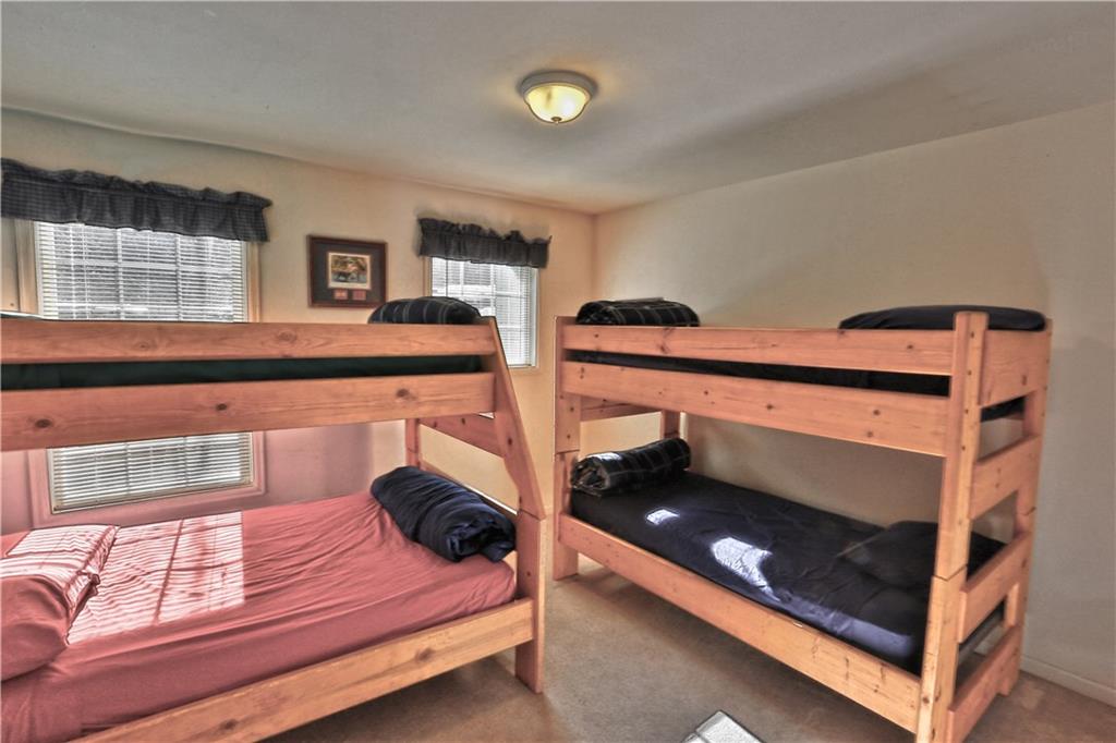 33 B Red Feather Road Breckenridge, CO 80424 - Photo 11 of 15 a bedroom with bed and a window