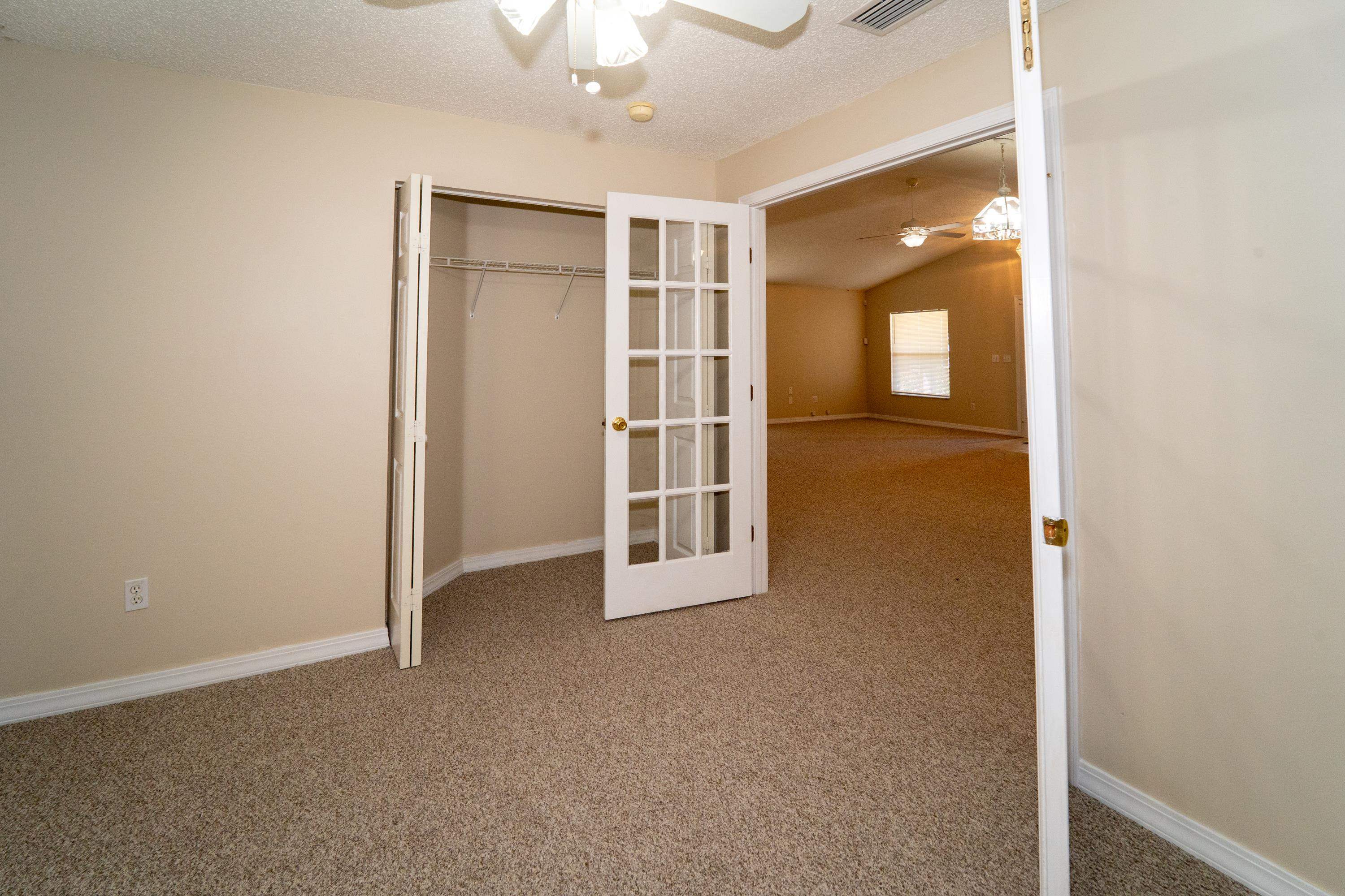 177 Marsh Island Circle St. Augustine, FL 32095 - Photo 21 of 33 a view of an empty room with a window
