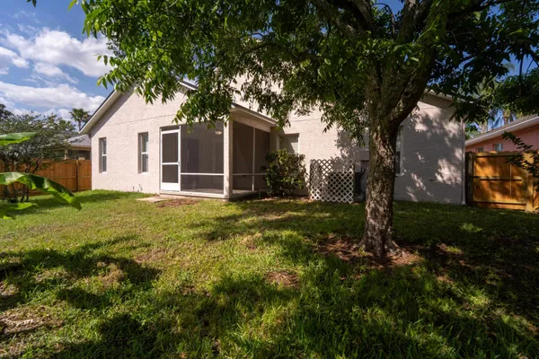 a backyard of a house with lots of green space