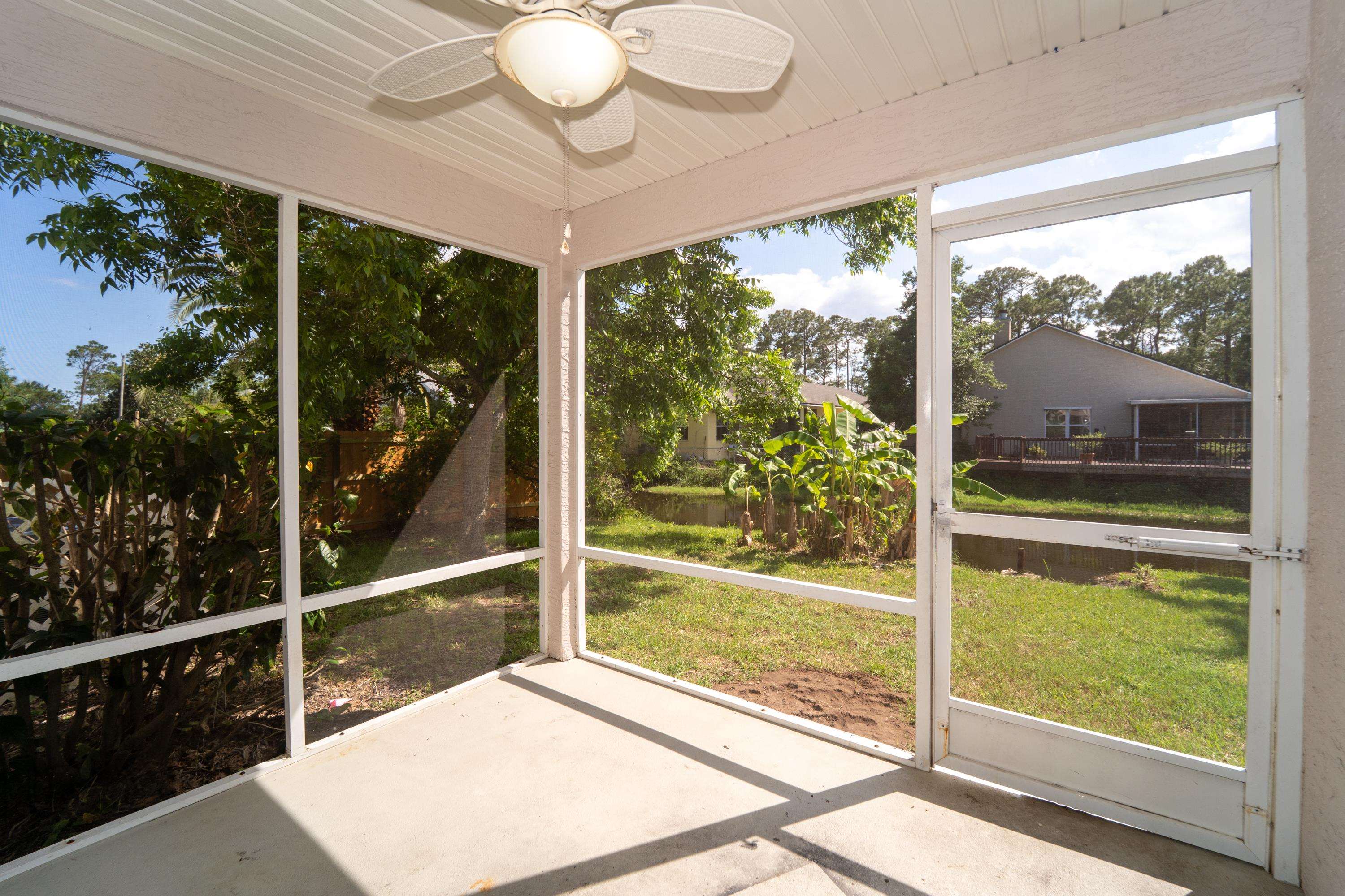 177 Marsh Island Circle St. Augustine, FL 32095 - Photo 4 of 33 a view of a porch and garden