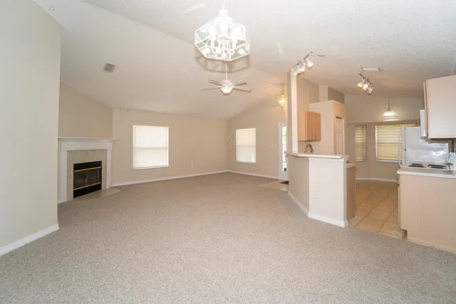 a view of a kitchen with furniture and a kitchen