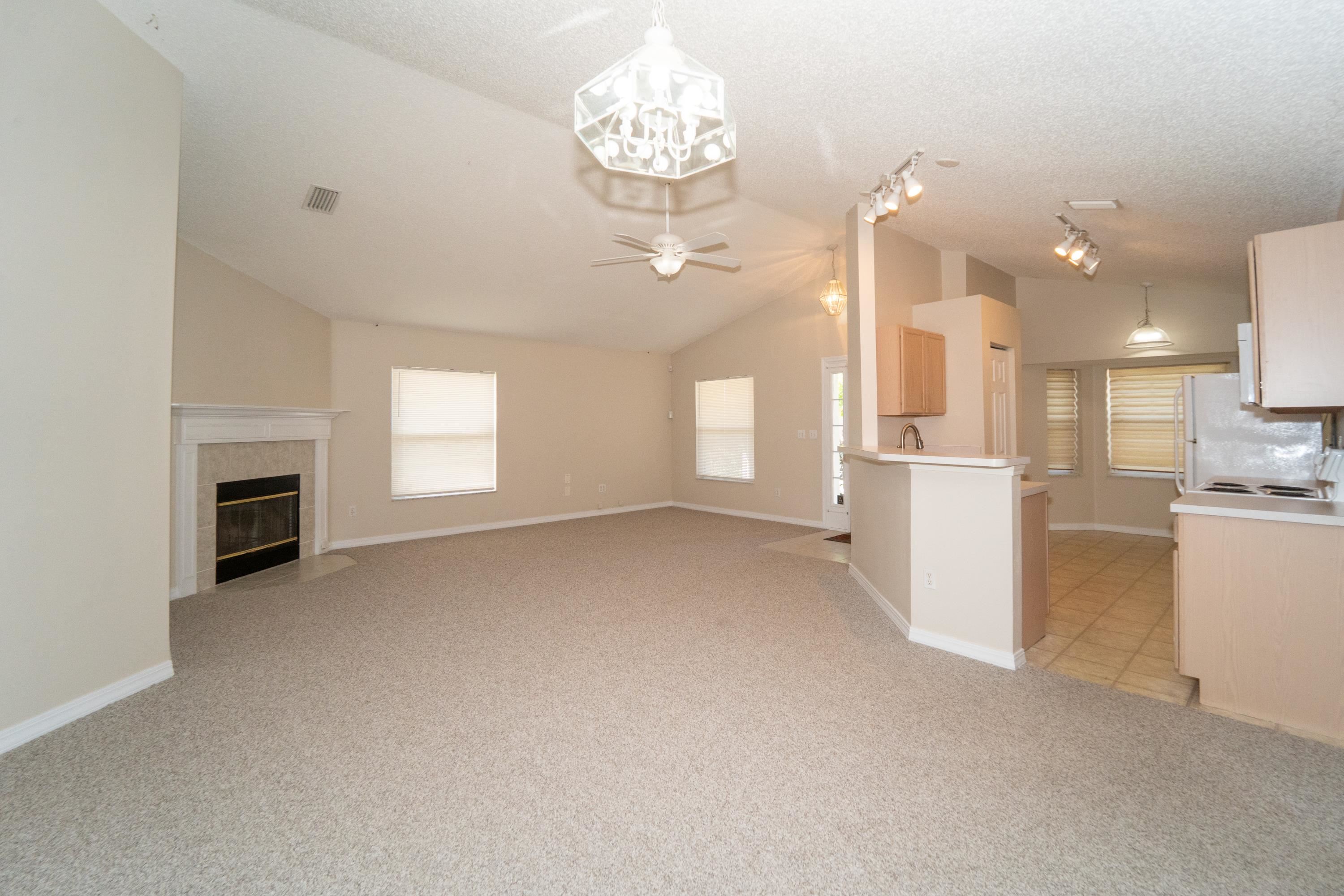 177 Marsh Island Circle St. Augustine, FL 32095 - Photo 8 of 33 a view of a kitchen with furniture and a kitchen