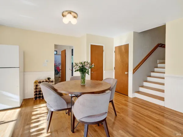 a kitchen with stainless steel appliances granite countertop a stove a sink dishwasher and a refrigerator