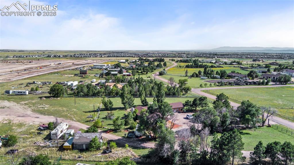 8065 Brule Road Colorado Springs, CO 80908 - Photo 2 of 10 an aerial view of a city with lots of residential buildings