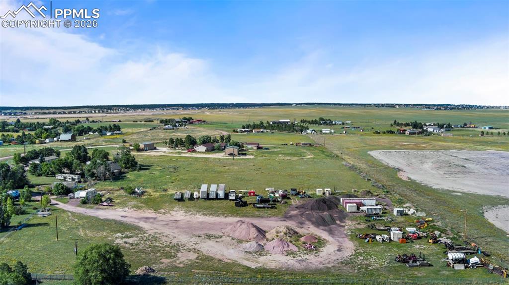 8065 Brule Road Colorado Springs, CO 80908 - Photo 6 of 10 a view of a lake with a yard