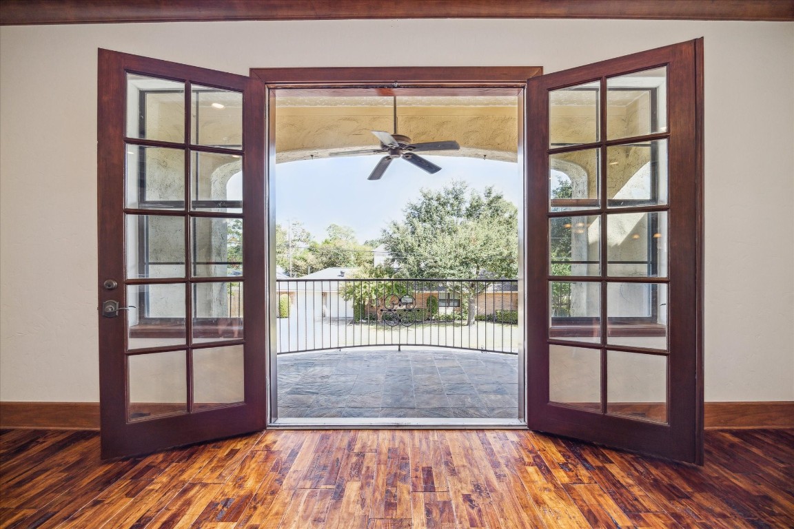 3614 Lancashire Street Houston, TX 77027 - Photo 12 of 47 a view of empty room with wooden floor and fan
