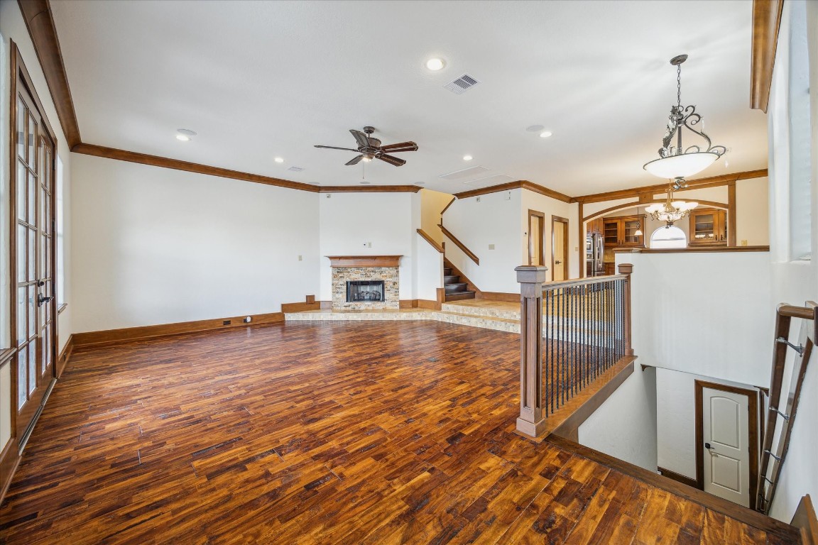 3614 Lancashire Street Houston, TX 77027 - Photo 15 of 47 a view of a livingroom with wooden floor and stairs