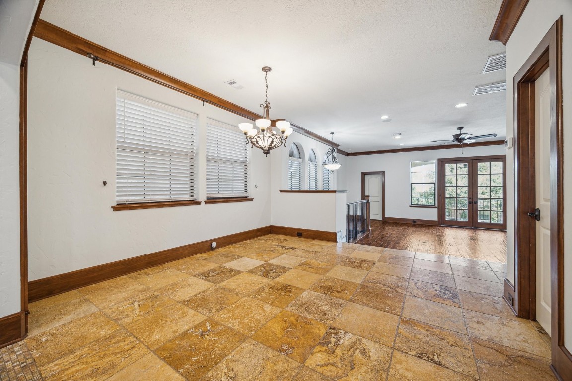 3614 Lancashire Street Houston, TX 77027 - Photo 16 of 47 a view of an empty room with a window