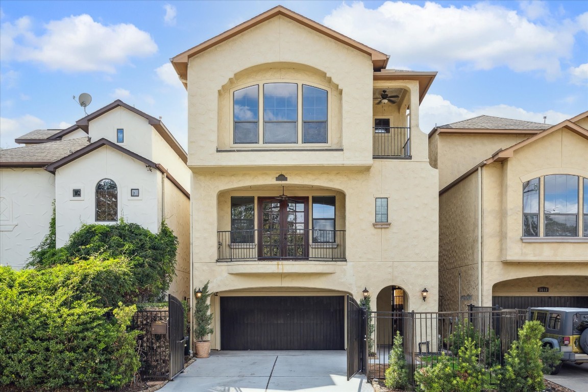 3614 Lancashire Street Houston, TX 77027 - Photo 2 of 47 a front view of a house with a yard